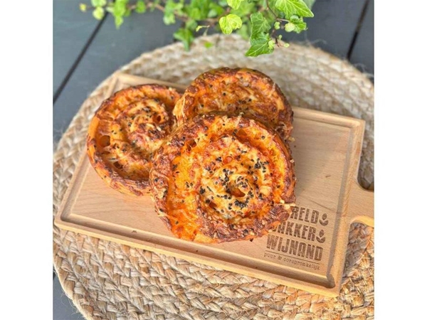 Aanbieding spicy ham/kaas rol per 2